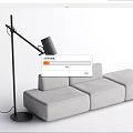 Gray Sectional Sofa With Black Floor Lamp In Modern Living Room