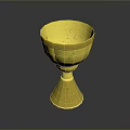 Exquisite Golden Carved Goblet Featuring Intricate Sculpted Patterns And Ornate Base