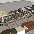 Vibrant Commercial Street Featuring Diverse Architectural Styles Plaza Shops And Pedestrians