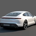 White Porsche Electric Sports Car With Sleek Exterior Design And Modern Look