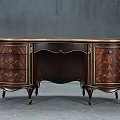 Elegant Vintage Dark Wood Writing Desk Featuring Gold Accents Carved Legs And Drawers