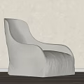 Modern Light Beige Fabric Armchair in Neutral Wall and Wooden Floor Setting