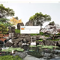 Natural Rock Garden Landscape With Stone Rocks Wood Elements Waterfalls And Lotus Pond