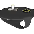 Modern Black Round Coffee Table With Sleek Glossy Surface And Decorative Items 3d model