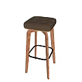 Modern Wooden Bar Stools With Gray Upholstered Seats And Metal Footrests