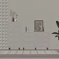 White Dressers With Drawers Decorative Painting And Potted Plant In Living Room