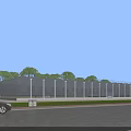 Modern Industrial Factory Building with Glass Curtain Wall Surrounded by Green Trees and Pedestrians