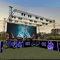 Outdoor Evening Stage With Metal Truss Lighting LED Screen Band Neon Decorations And Grass Background