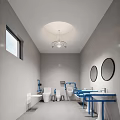 Public Restroom with Gray Walls Round Mirrors Blue Handrails and White Fixtures