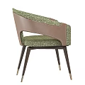 Green Fabric Leisure Chair With Brown Leather Armrests And Dark Legs With Gold Accents