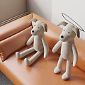 Two Cute Beige Dog Shaped Decorative Pillows Sitting On Orange Sofa