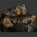Natural Rock With Colorful Orange Black Brown Hues And Rough Textured Surface