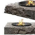 Two Outdoor Fire Pits With Natural Rock Base And Burning Flames