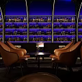 Stylish Bar Interior With Blue Lit Wine Racks Brown Leather Chairs And Small Tables