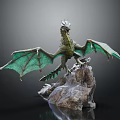 Intricate Mythical Dragon Sculpture With Green Wings Perched On Rock Base