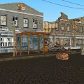 Old Brick Storefront Buildings With Vintage Signage And Utility Poles On Cobblestone Street