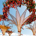 Seaside Photo Check In Spot With Heart Shaped Floral Arch Golden Frame And White Platform