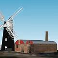 Traditional Windmill Structure With Red Brick Building Chimney And Metal Roof