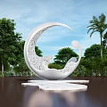 White Crescent Sculpture With Intricate Carvings Surrounded By Trees And Palm Trees Under Blue Sky