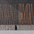 Decorative Bamboo Screens Placed in Stone Planters Against Dark Stone Wall