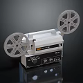 Vintage Projection Monitoring Equipment With Film Reels And Control Knobs On Dark Surface