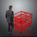 A man in suit standing beside red metal mesh cart with multiple layers and wheels