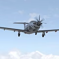 Passenger Plane Flying With Propeller And Landing Gear In Blue Sky With Clouds
