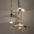 Elegant Modern Chandelier with Sleek Metallic Curved Panels and Floating Illuminated Design