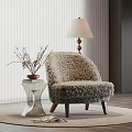 Cozy Furry Beige Accent Chair With Glass Side Table Floor Lamp On Round Rug