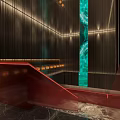 Contemporary Red Staircase Interior With Illuminated Accents And Marble Water Feature