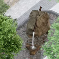 Serene Garden Landscape With Natural Stone Fountain Flowing Water And Paved Surroundings