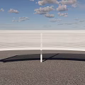 White Modern Public Bench With Perforated Striped Design Under Cloudy Sky On Gray Gravel Ground