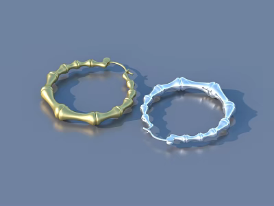 Stylish Gold And Silver Hoop Earrings With Bamboo Texture Design 3d model