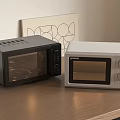 Modern Black And White Microwaves As Stylish Kitchen Appliances On Wooden Countertop