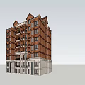 Red Brick Multi story Building Exterior With Decorative Top And White Base