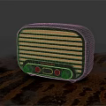 Vintage Headphone Speaker With Retro Grille Design And Metallic Body On Textured Tabletop