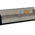 Modern Beige Two-Seater Sofa With Black Side Shelf And Throw Pillows
