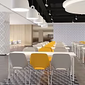 Modern Dining Area With Yellow Gray Chairs White Tables And Geometric Wall Decor