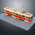 Red And Beige Tram Train With Pantograph On Top Parked On Gray Platform