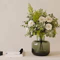Elegant Decorative Ornament Set With Green Vase White Flowers Leaves Books And Small Black Box