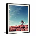 Figure Painting Of Astronaut Standing On Red Rock With Blue Sky Clouds And Flying Birds