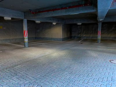 Underground Parking Garage With Gray Paved Floor Red White Striped Columns And Ceiling Lights 3d model