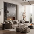 Elegant Modern Living Room With Gray Sofa Round Coffee Table And Black Marble Fireplace