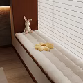 Cozy Window Seat Interior With Rabbit Doll And Yellow Flower Cushion