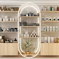 Elegant Golden Frame Display Shelves With Various Products White Cabinets And Green Plants
