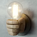 Wooden Fist Shaped Wall Lamp With Transparent Bulb And Glowing Filament On Gray Wall