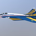 Pakistan Air Force Fighter Jet Flying With Blue Yellow White Livery Against Clear Sky Background
