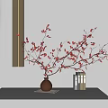 Brown Vase With Branches And Red Small Leaves On White Tabletop With Books Beside