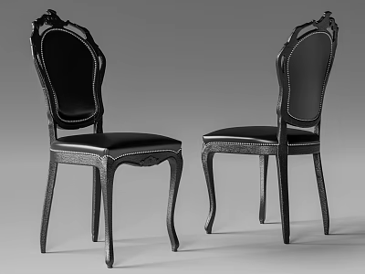 Elegant Black Dining Chairs With Leather Upholstered Seats And Ornate Carved Details 3d model