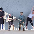 Group of People Doing Various Activities Chef Preparing Food Playing Guitar Stretching By Gray Wall